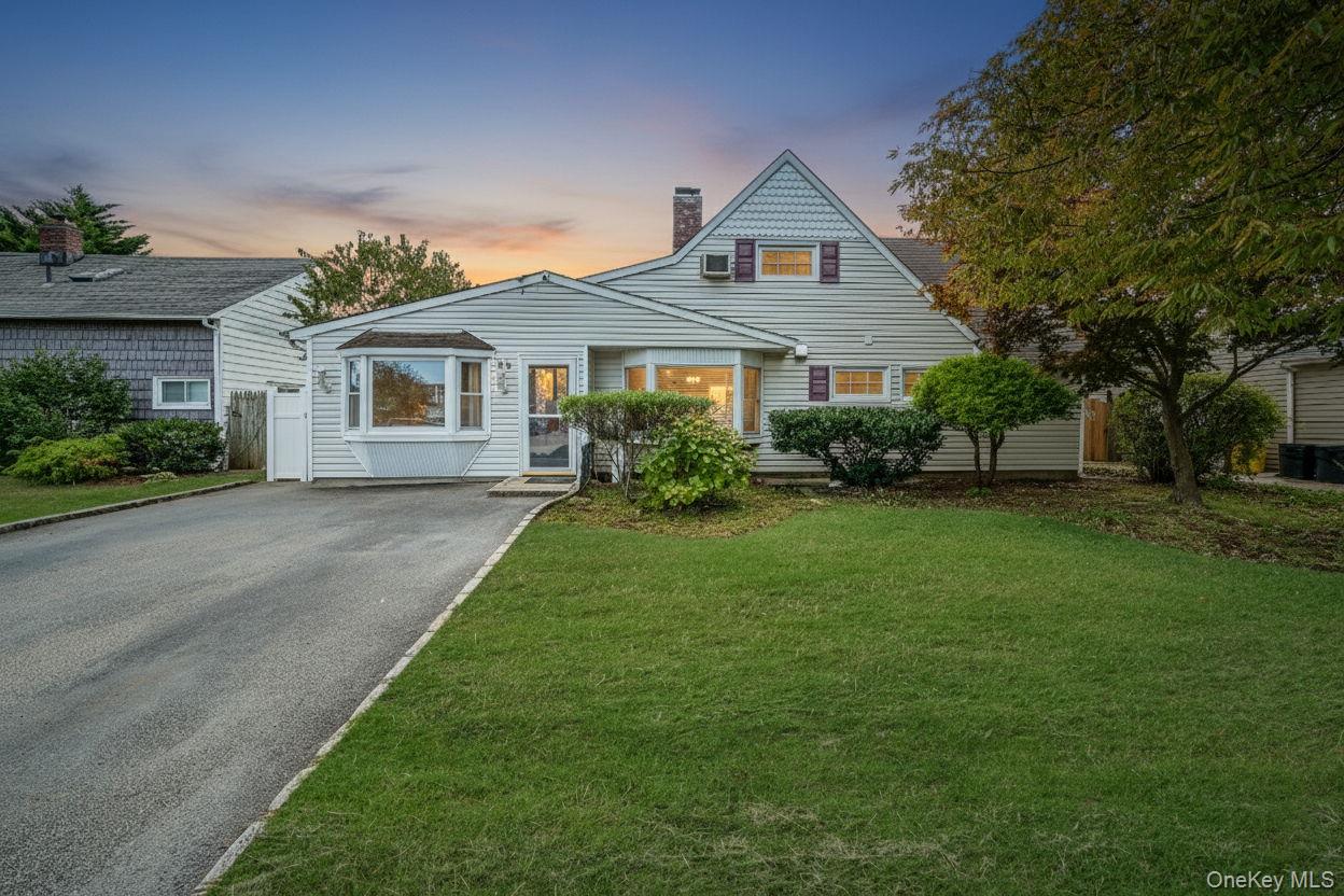 95 Lantern Road Hicksville, NY 11801 - Photo 1 of 36 a front view of house with yard and green space