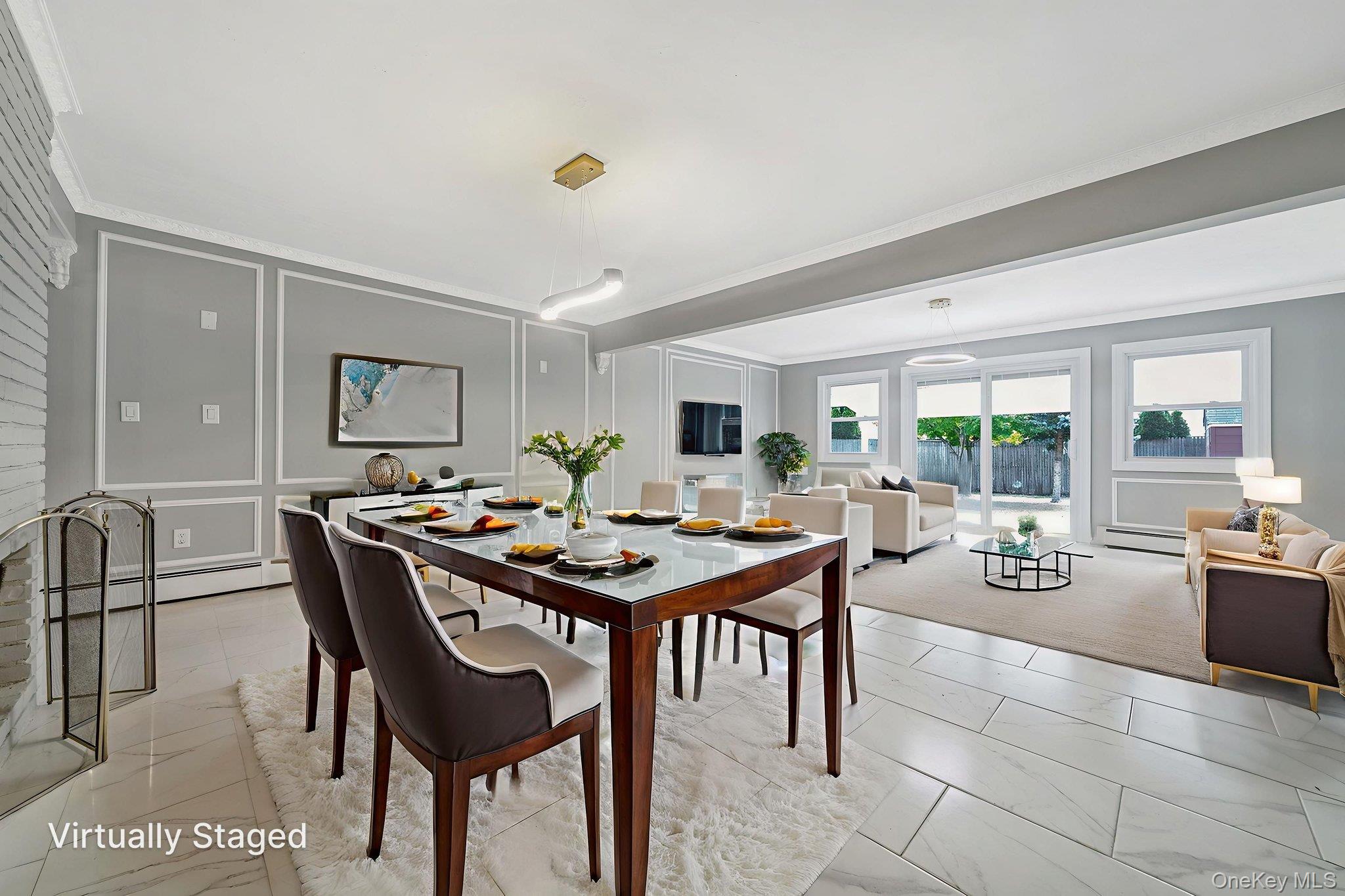 95 Lantern Road Hicksville, NY 11801 - Photo 11 of 36 a view of a dining room and livingroom with furniture wooden floor and a rug