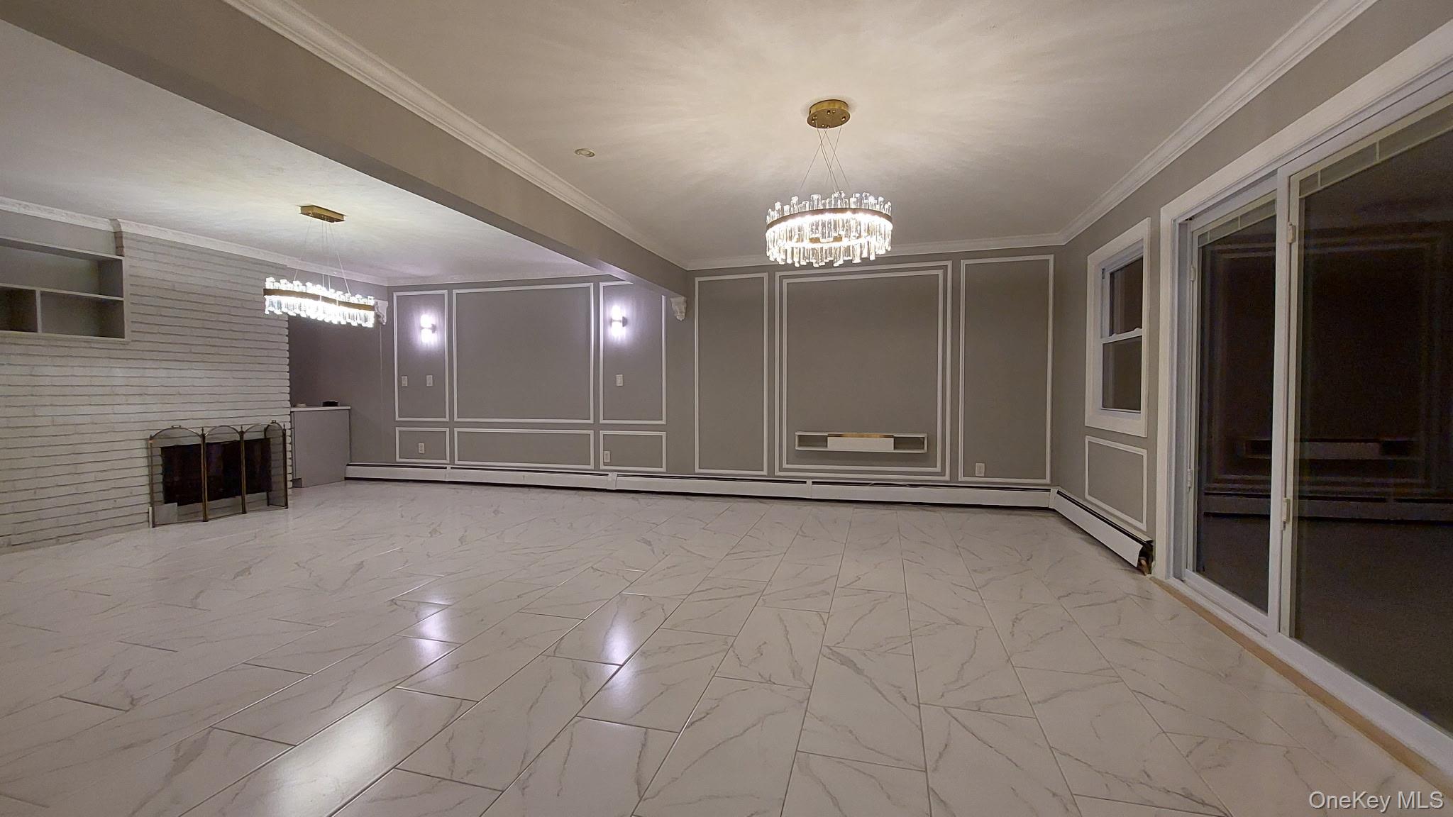 95 Lantern Road Hicksville, NY 11801 - Photo 16 of 36 an empty room with fireplace and mirrors