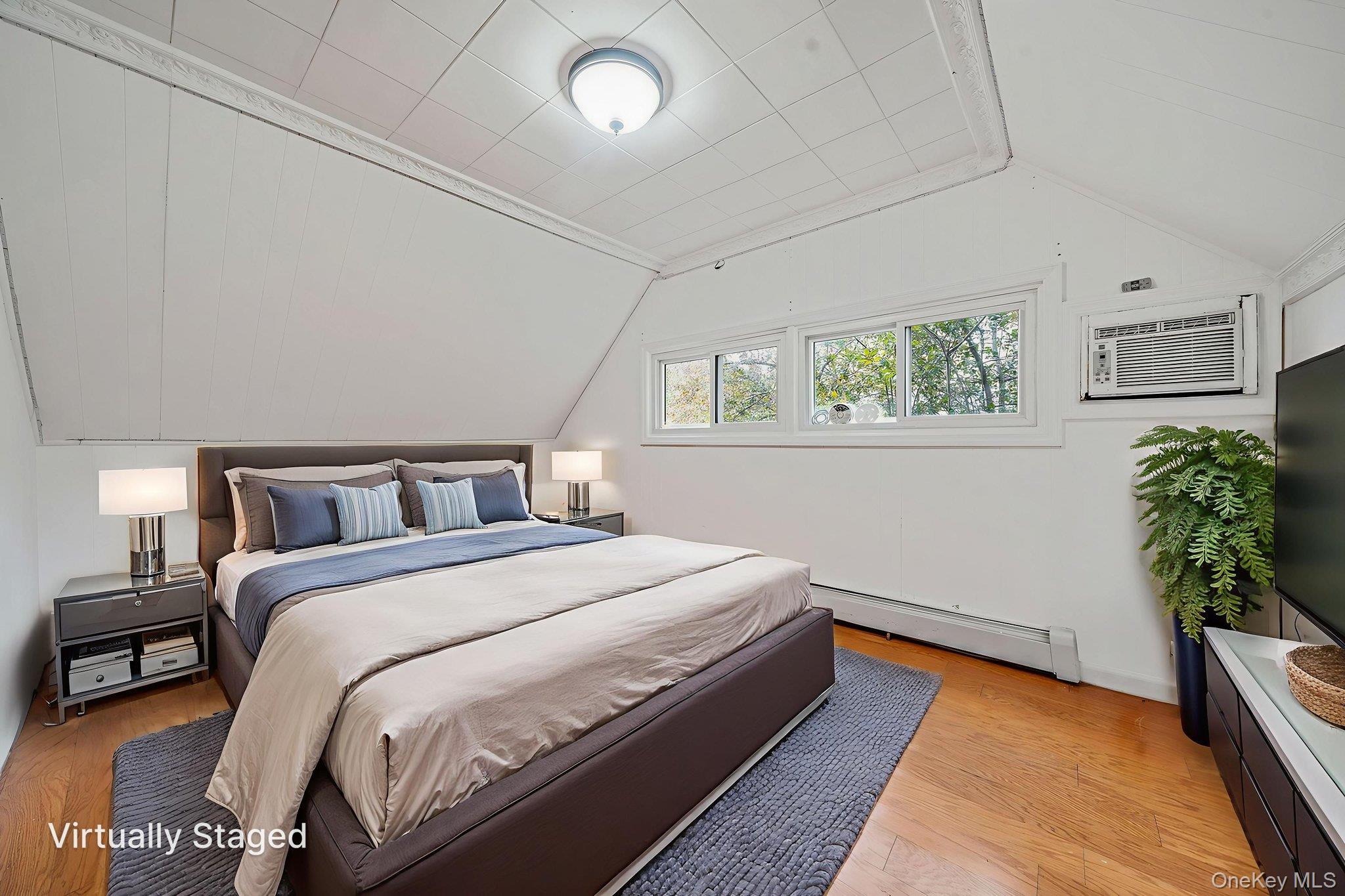 95 Lantern Road Hicksville, NY 11801 - Photo 23 of 36 a bedroom with bed and window
