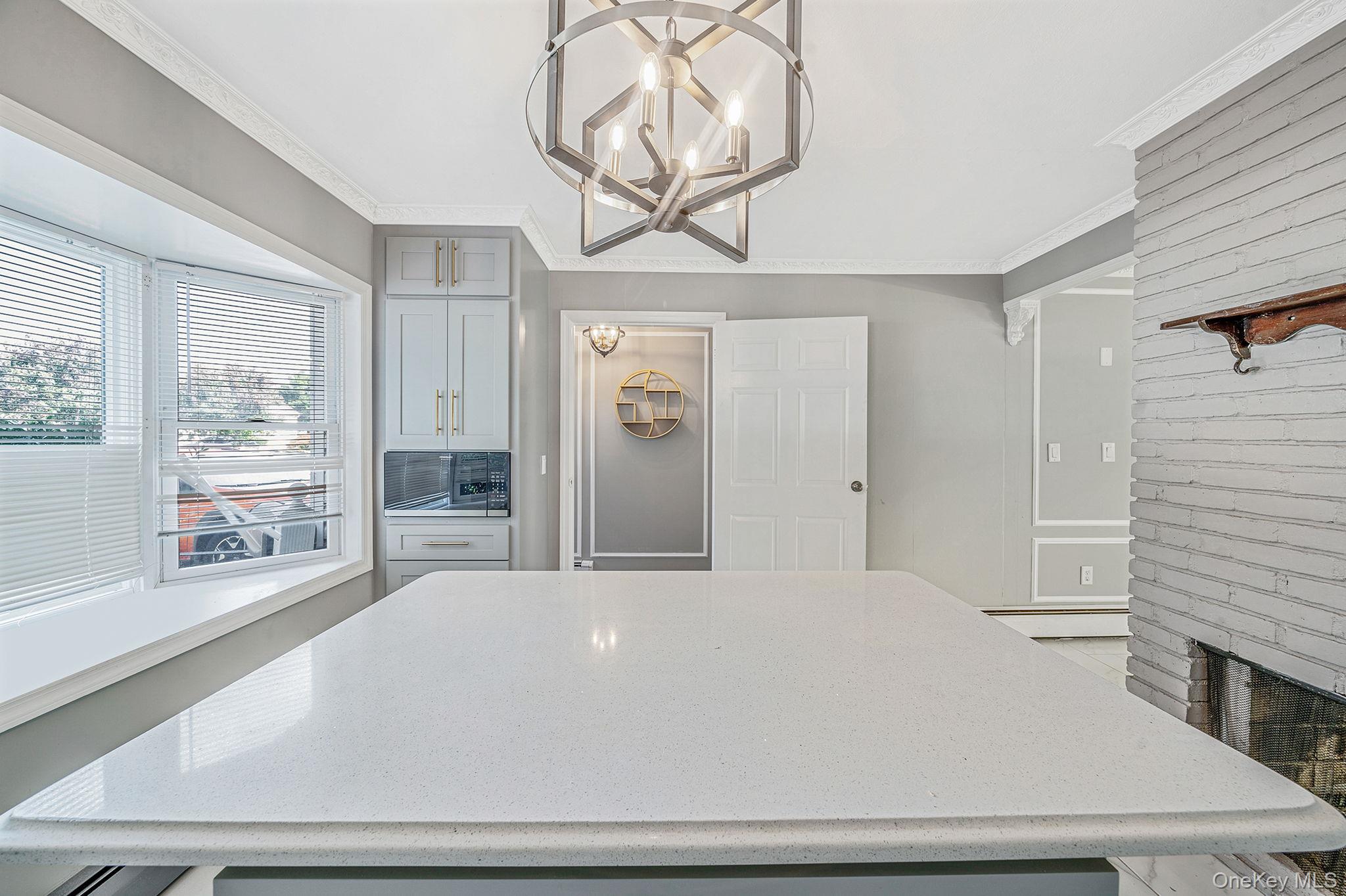 95 Lantern Road Hicksville, NY 11801 - Photo 6 of 36 a large white bed in a white room