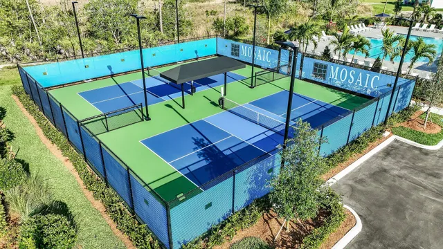 a room with gym equipment and a large window