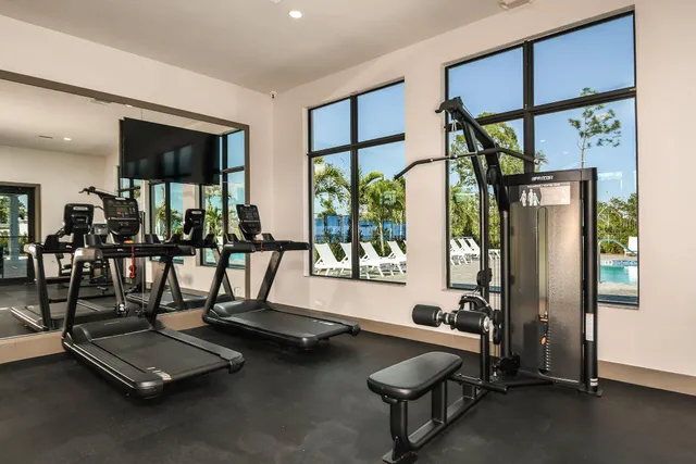 a view of a swimming pool with an outdoor seating