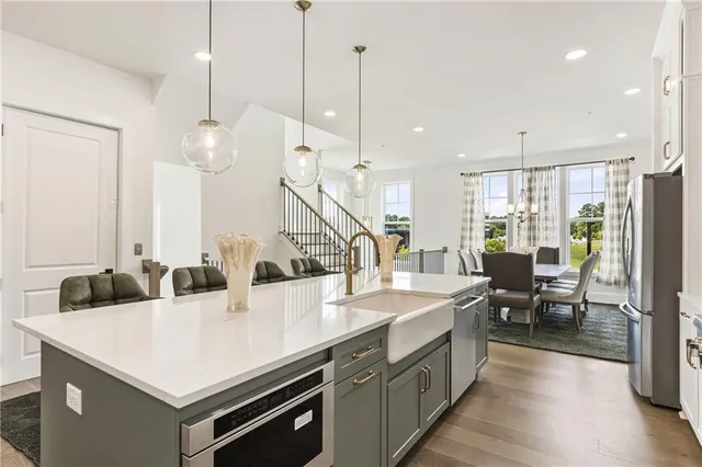 a bedroom with a large bed and a large window