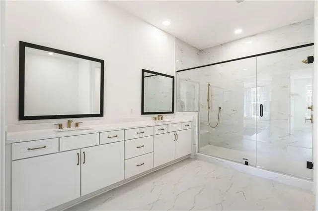 an aerial view of a house with a swimming pool