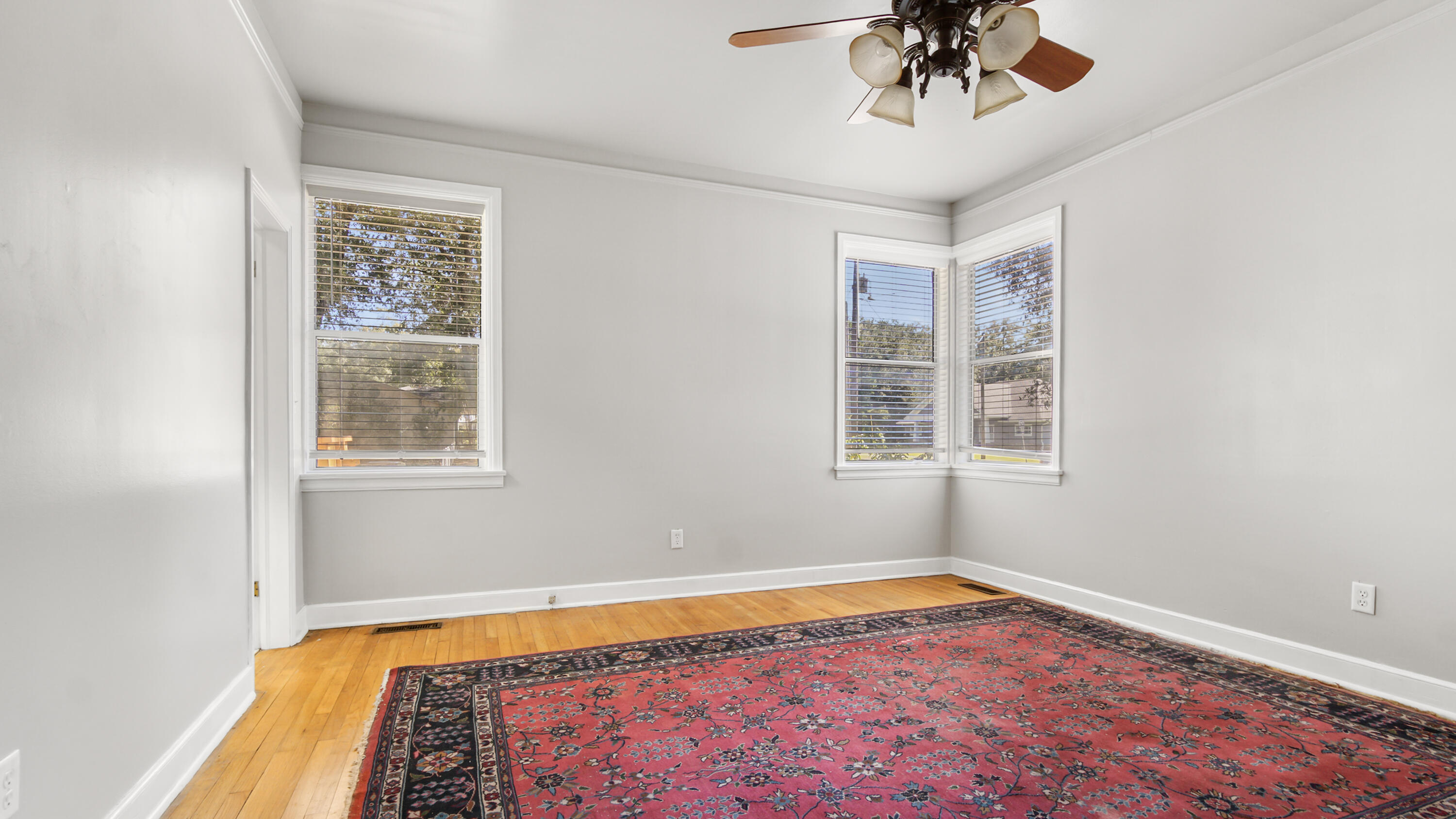 111 Bay Avenue DeFuniak Springs, FL 32435 - Photo 16 of 51 a view of a room with window and a ceiling fan