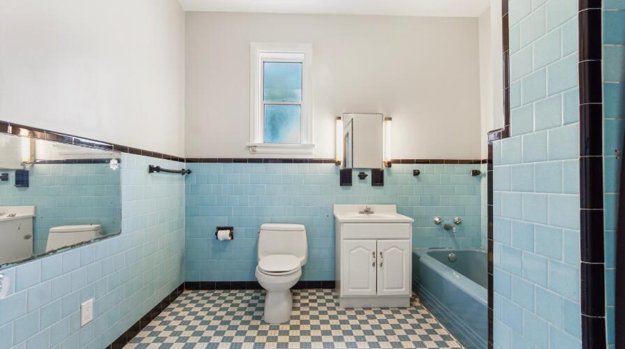 111 Bay Avenue DeFuniak Springs, FL 32435 - Photo 24 of 51 a bathroom with a toilet a sink and a shower