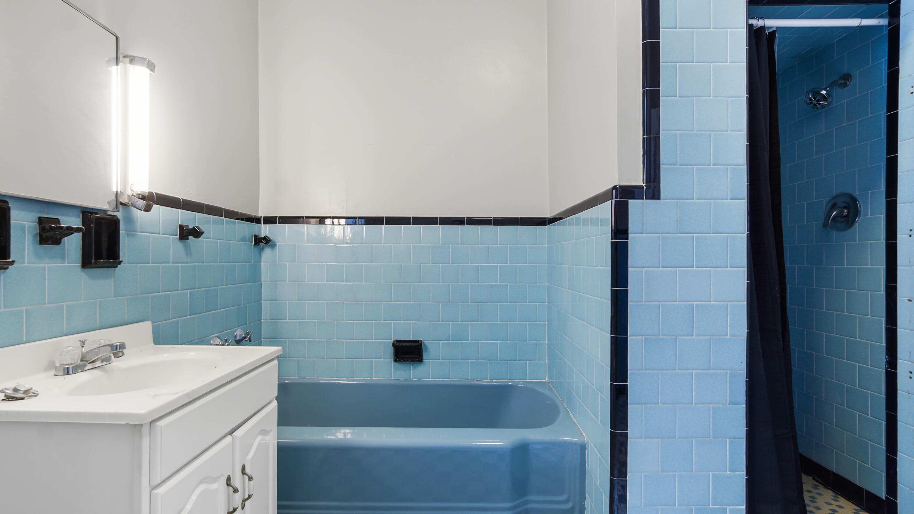111 Bay Avenue DeFuniak Springs, FL 32435 - Photo 25 of 51 a bathroom with a sink a toilet and shower