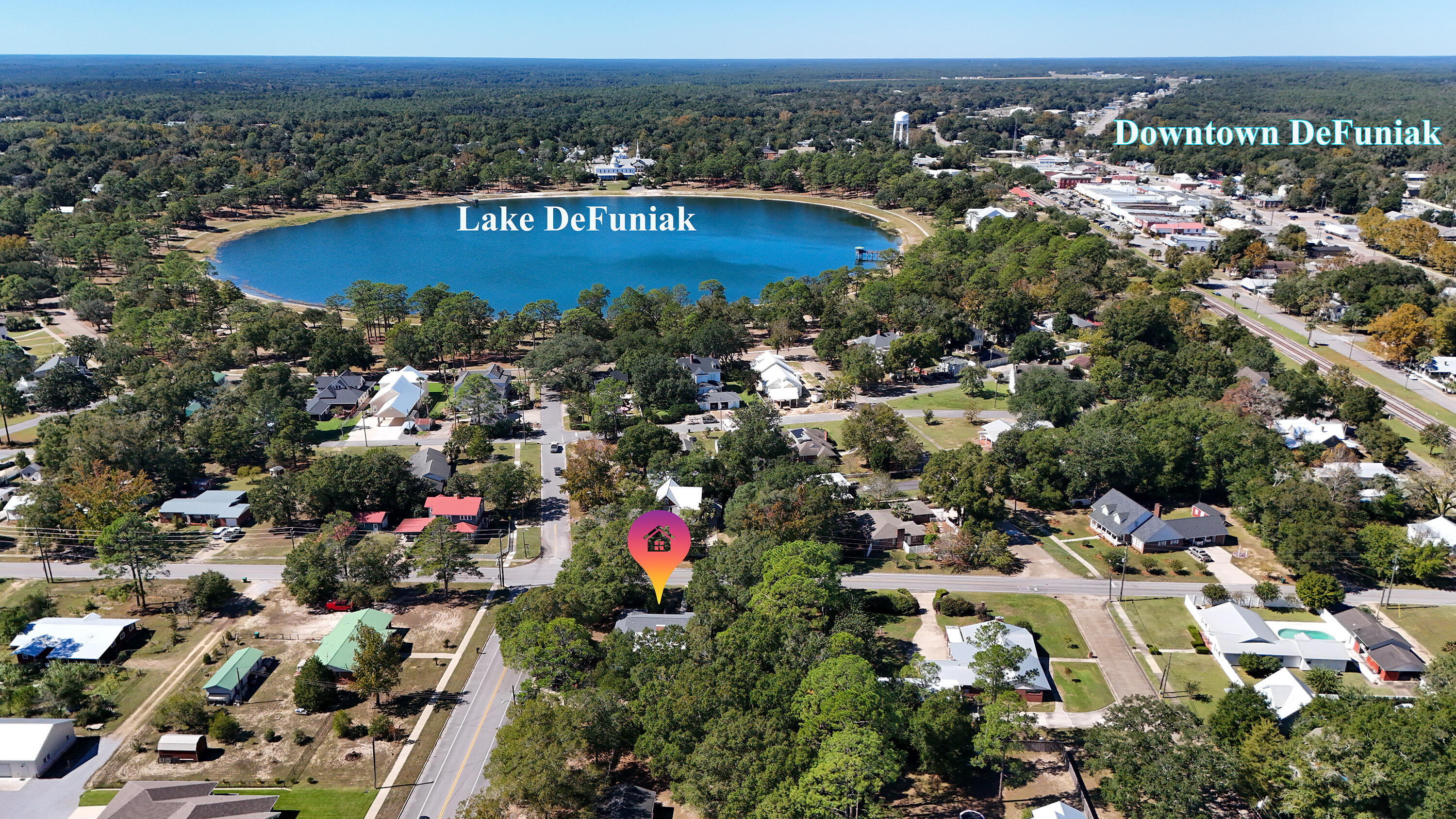 111 Bay Avenue DeFuniak Springs, FL 32435 - Photo 3 of 51 an aerial view of residential houses with outdoor space and seating
