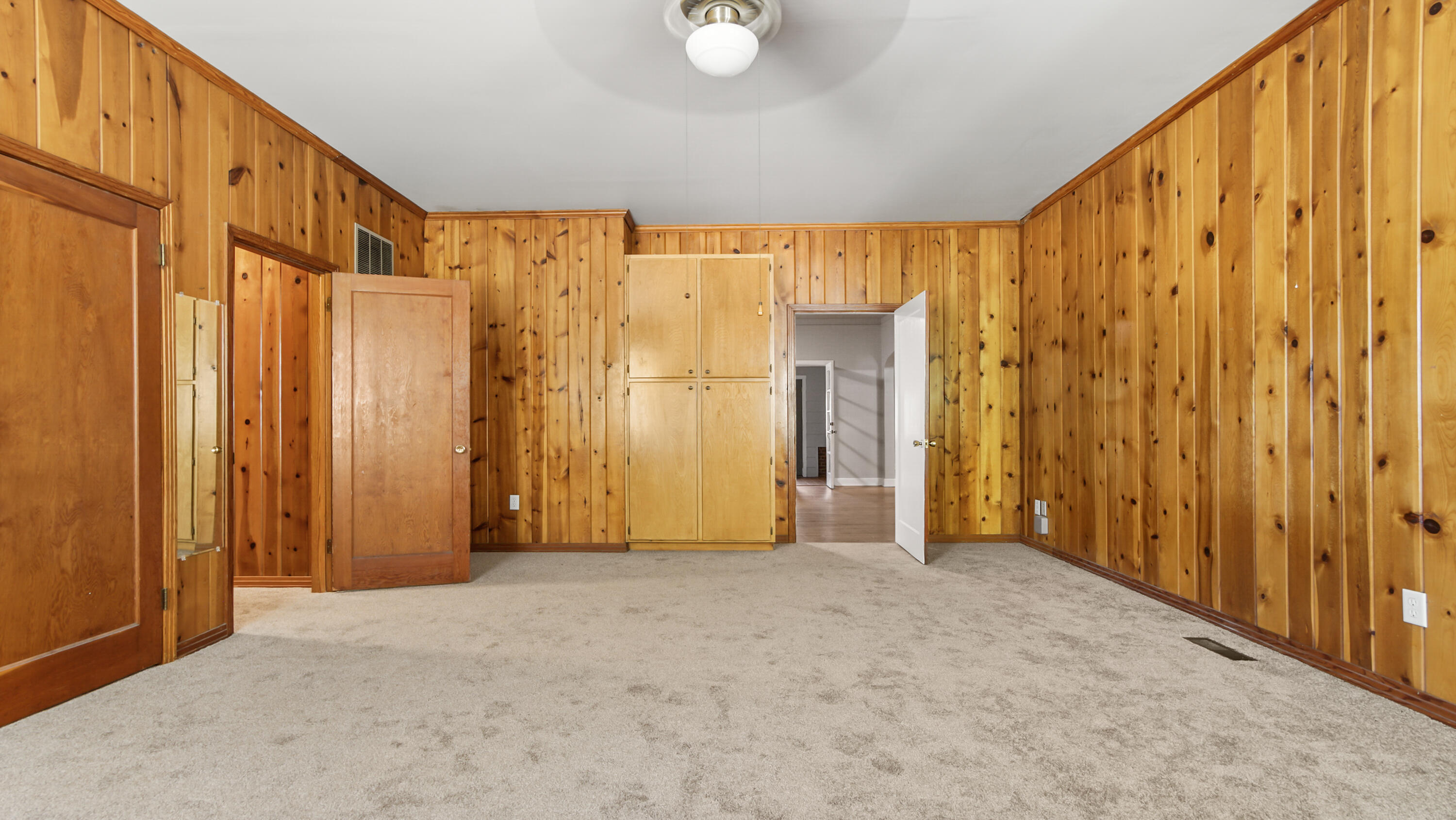 111 Bay Avenue DeFuniak Springs, FL 32435 - Photo 37 of 51 a view of a big room with wooden walls