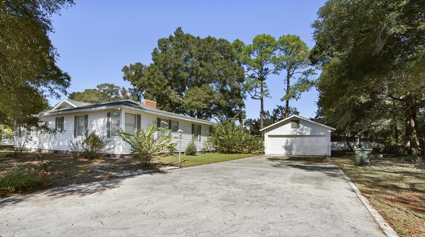 111 Bay Avenue DeFuniak Springs, FL 32435 - Photo 40 of 51 a view of a yard with a house in the background