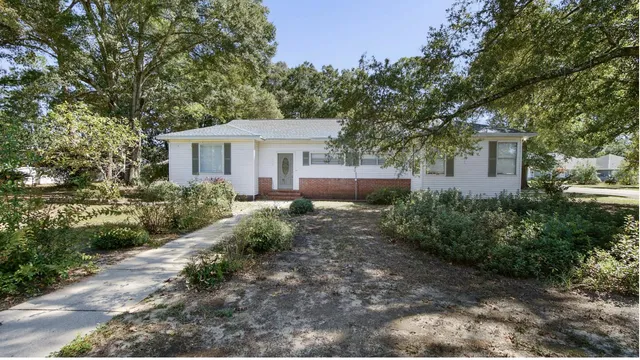 a house view with a outdoor space