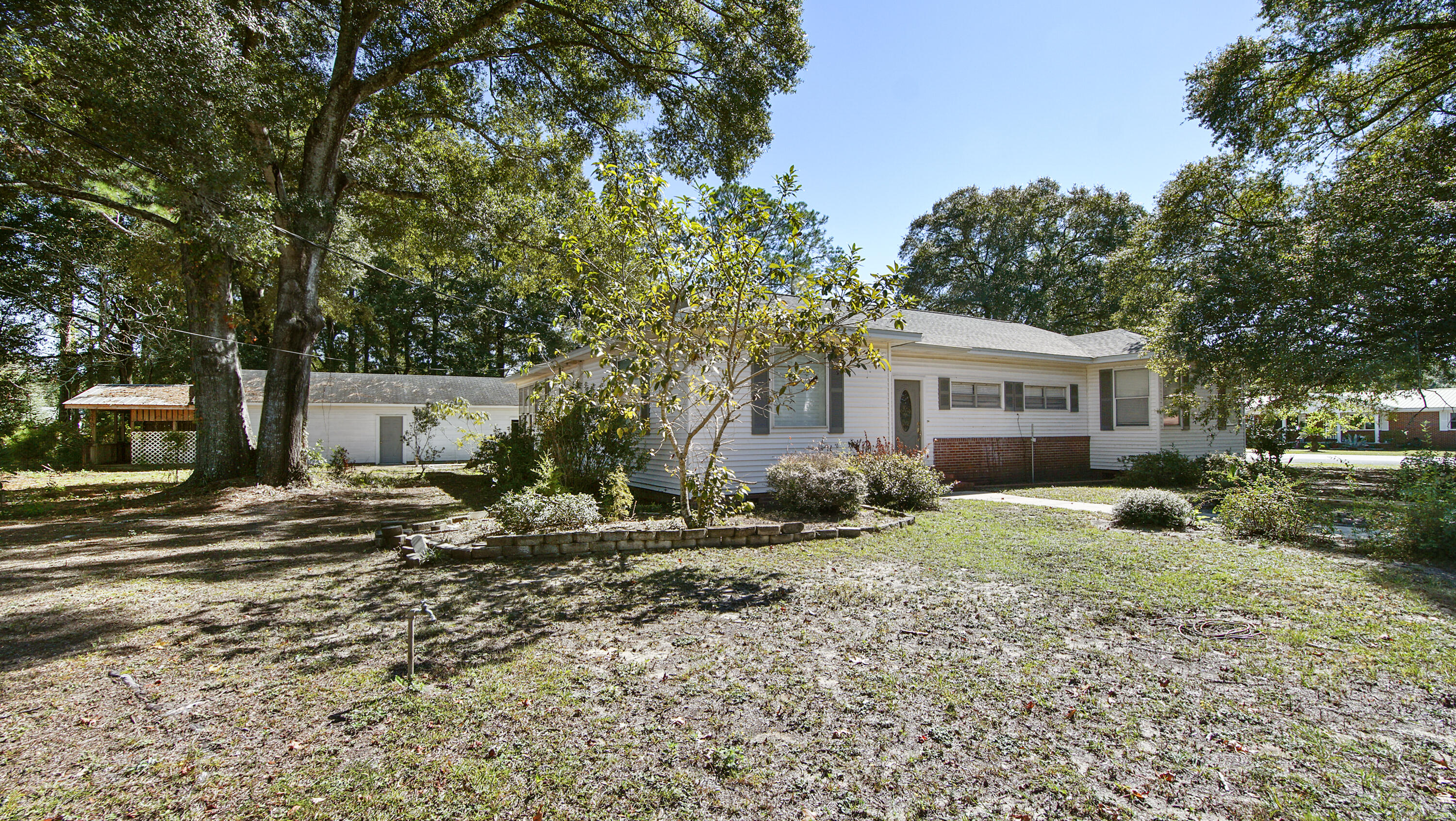 111 Bay Avenue DeFuniak Springs, FL 32435 - Photo 47 of 51 a view of a house with a yard