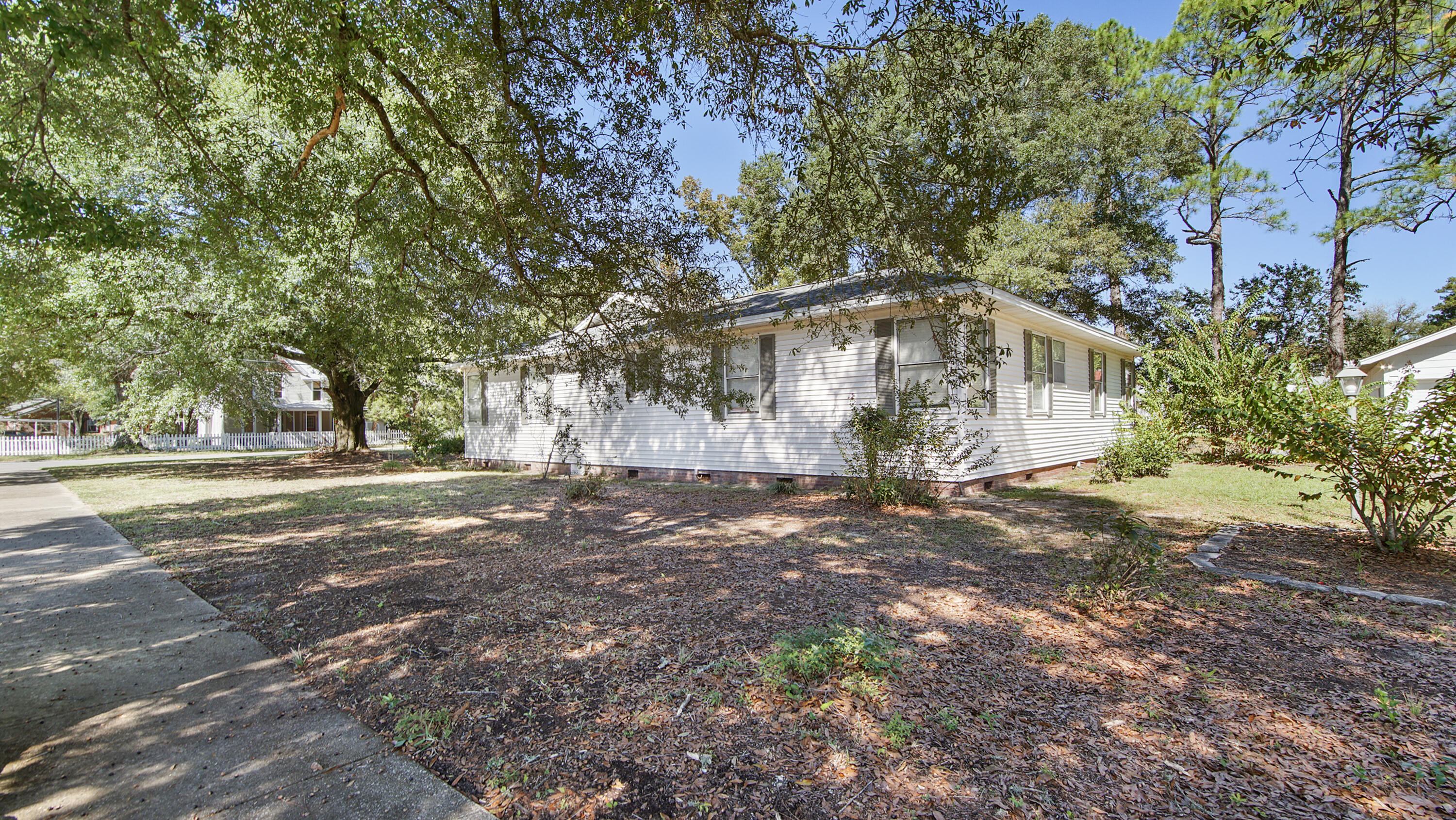 111 Bay Avenue DeFuniak Springs, FL 32435 - Photo 48 of 51 a view of a house with a yard