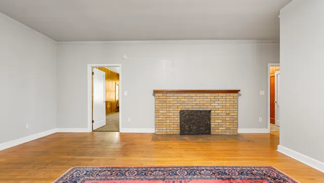 a view of an empty room and window