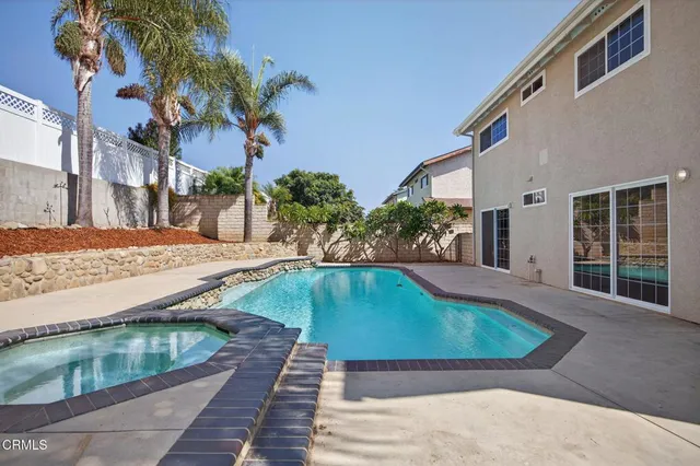 a view of a backyard with a patio