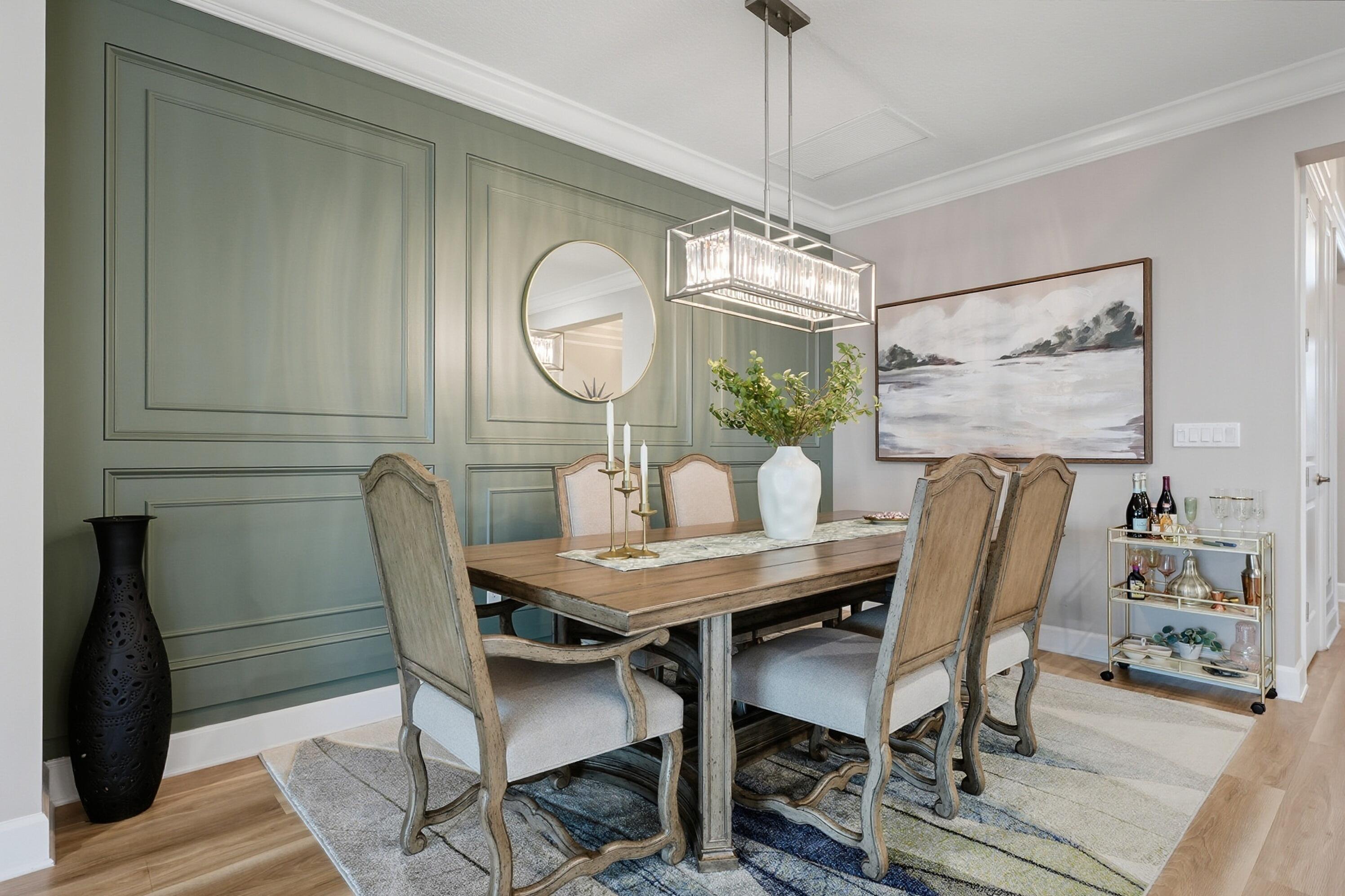 11784 Southwest Sailfish Isles Way Port St. Lucie, FL 34987 - Photo 16 of 77 a view of a dining room with furniture window and wooden floor