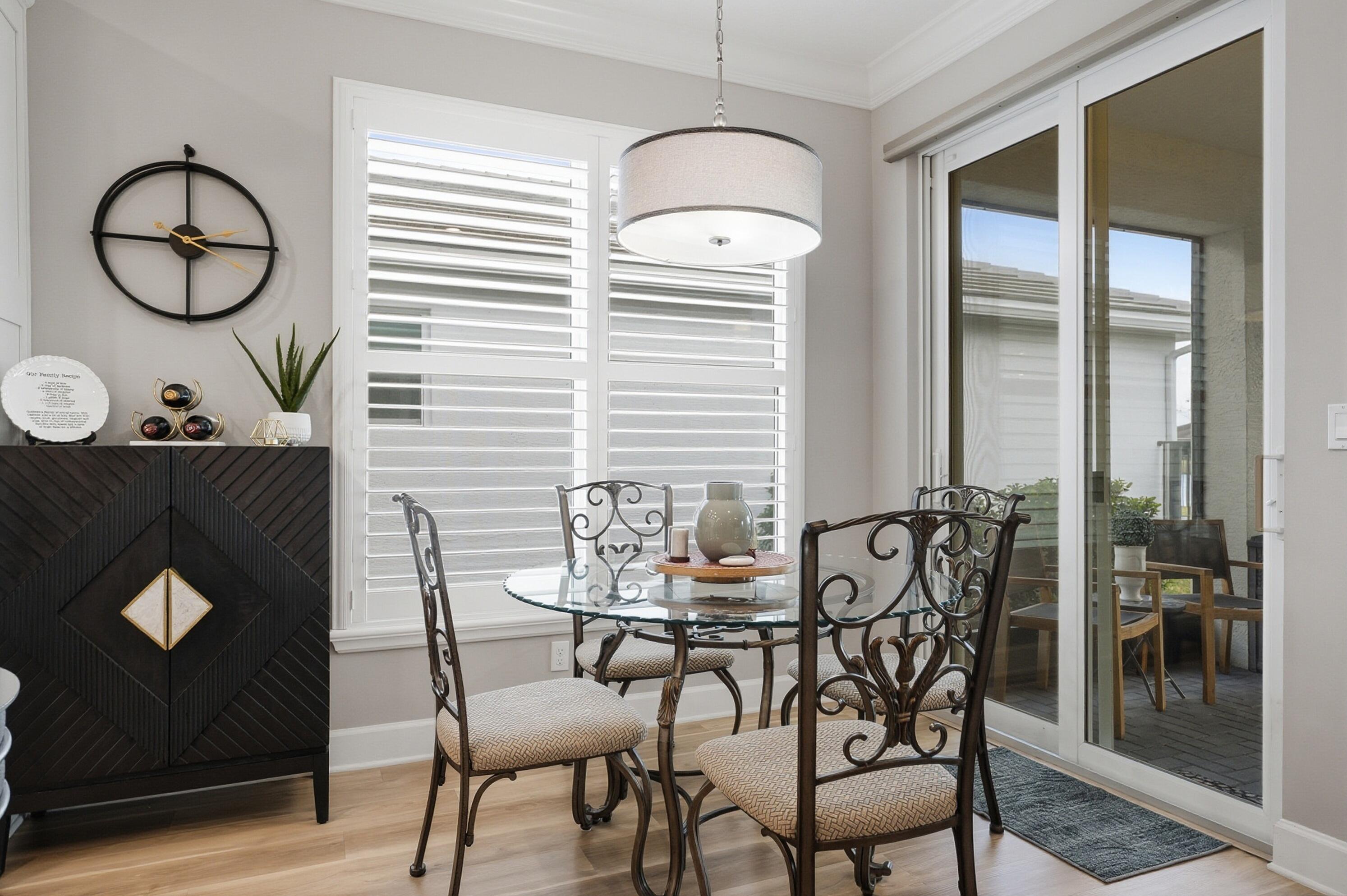 11784 Southwest Sailfish Isles Way Port St. Lucie, FL 34987 - Photo 17 of 77 a view of a dining room with furniture and window