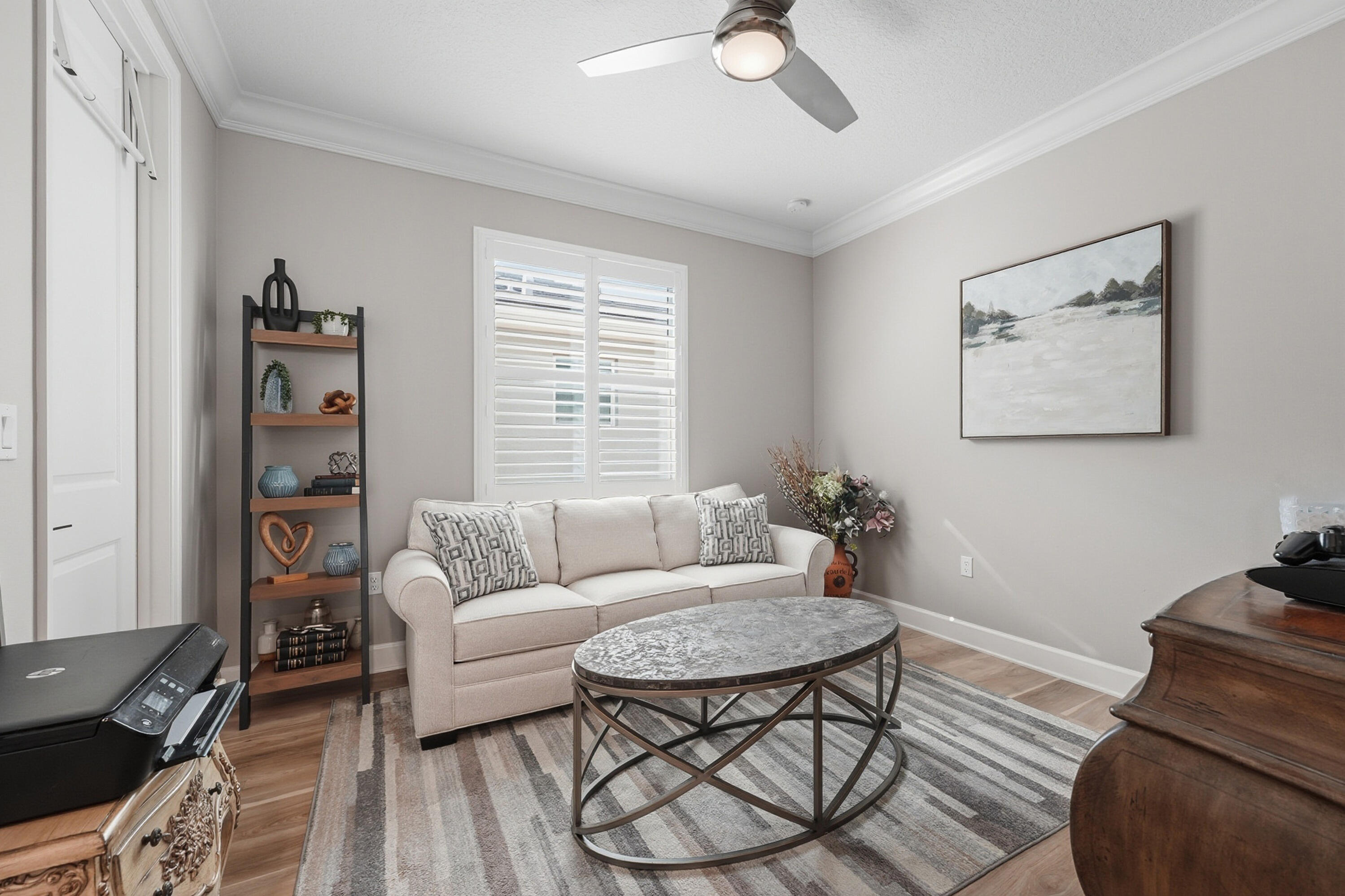 11784 Southwest Sailfish Isles Way Port St. Lucie, FL 34987 - Photo 26 of 77 a living room with furniture and a window