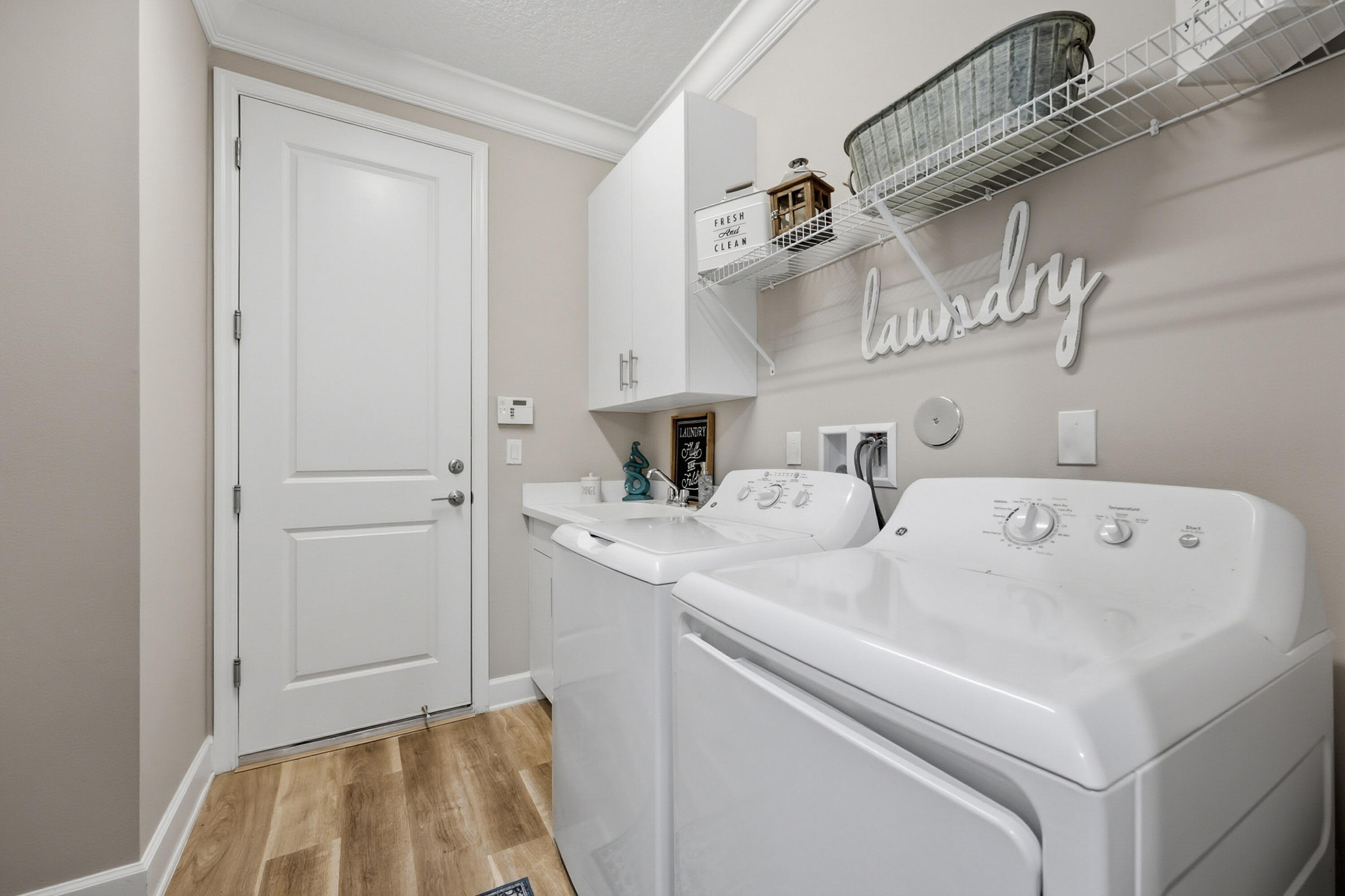 11784 Southwest Sailfish Isles Way Port St. Lucie, FL 34987 - Photo 29 of 77 Laundry Room