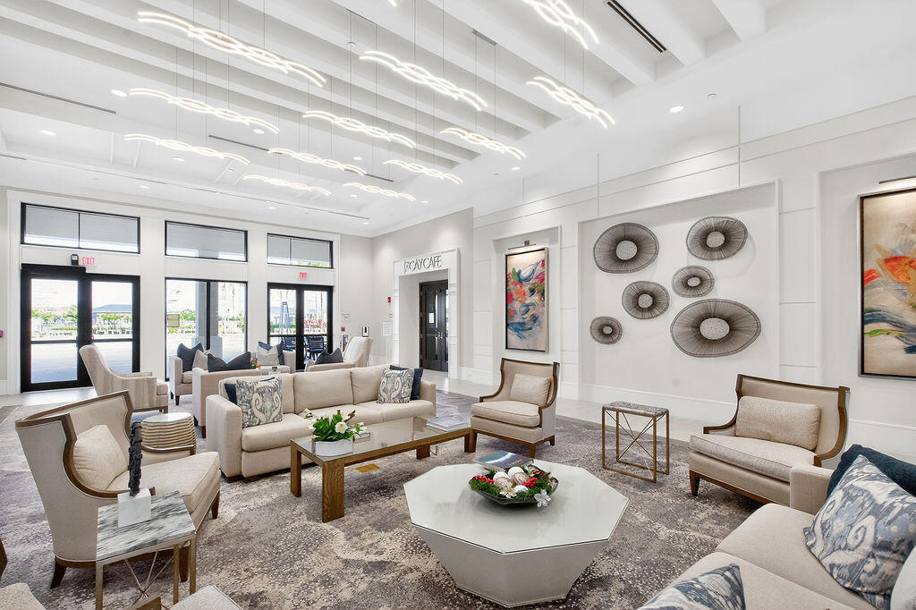 11784 Southwest Sailfish Isles Way Port St. Lucie, FL 34987 - Photo 41 of 77 a living room with furniture rug and window