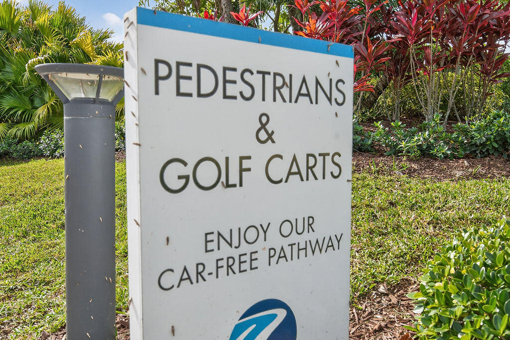 11784 Southwest Sailfish Isles Way Port St. Lucie, FL 34987 - Photo 56 of 77 a sign broad on a pole