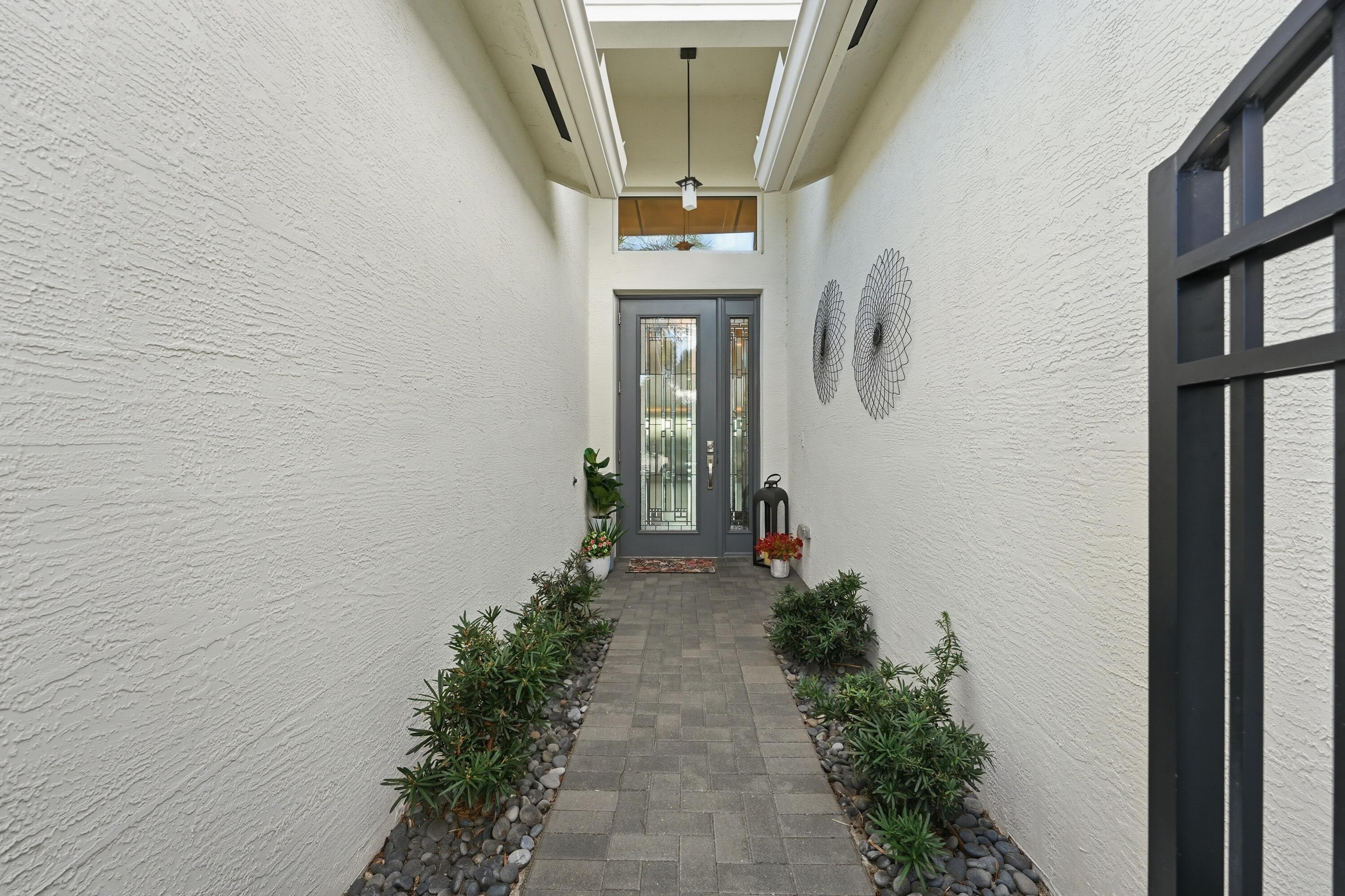 11784 Southwest Sailfish Isles Way Port St. Lucie, FL 34987 - Photo 6 of 77 Walkway