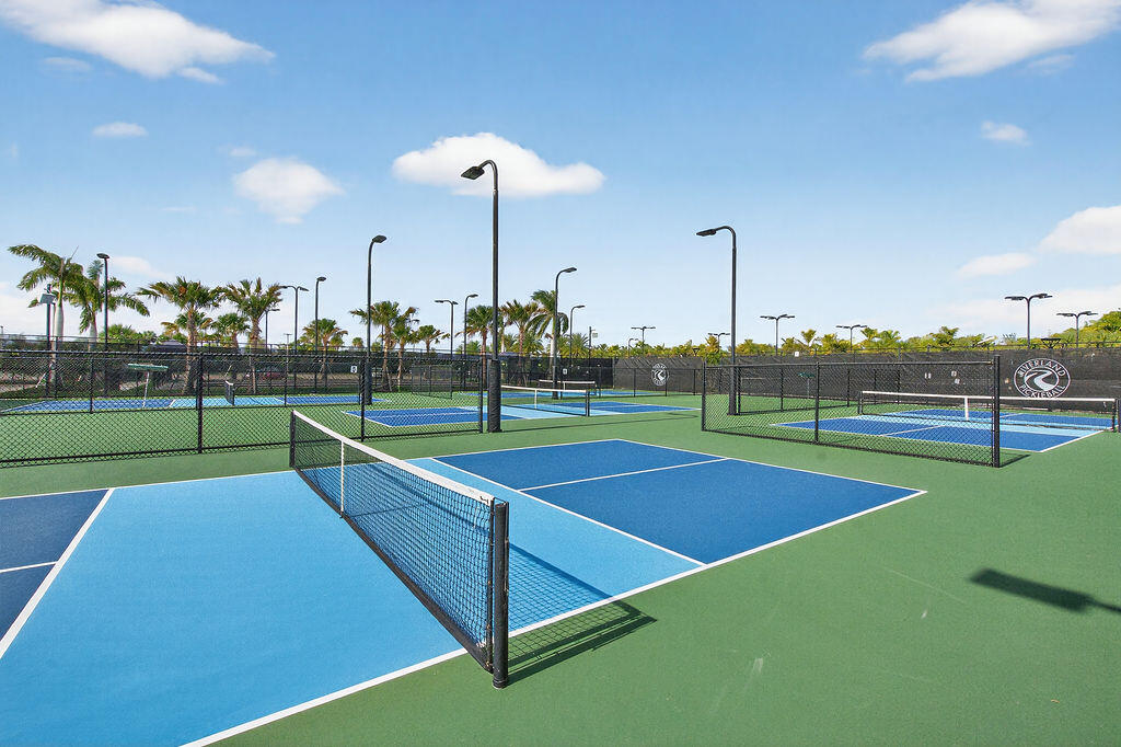 11784 Southwest Sailfish Isles Way Port St. Lucie, FL 34987 - Photo 62 of 77 a view of a tennis court
