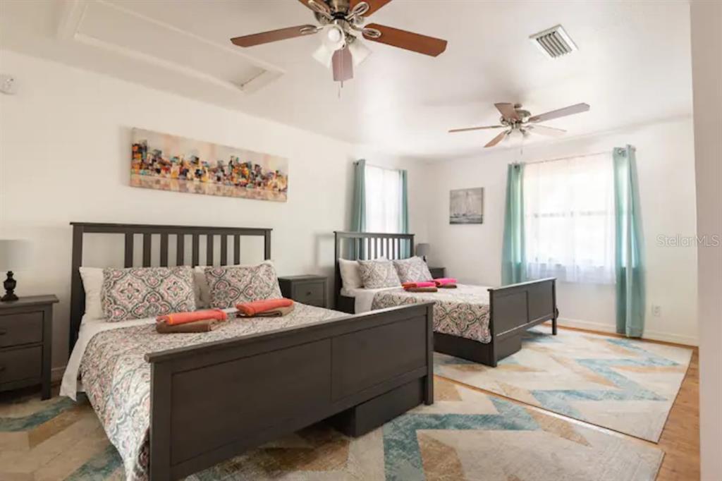 368 Ridge Road Southwest Largo, FL 33770 - Photo 14 of 46 a bedroom with a bed and window