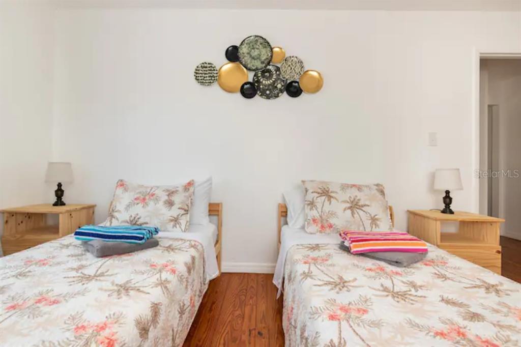 368 Ridge Road Southwest Largo, FL 33770 - Photo 23 of 46 a bedroom with a bed and a couch