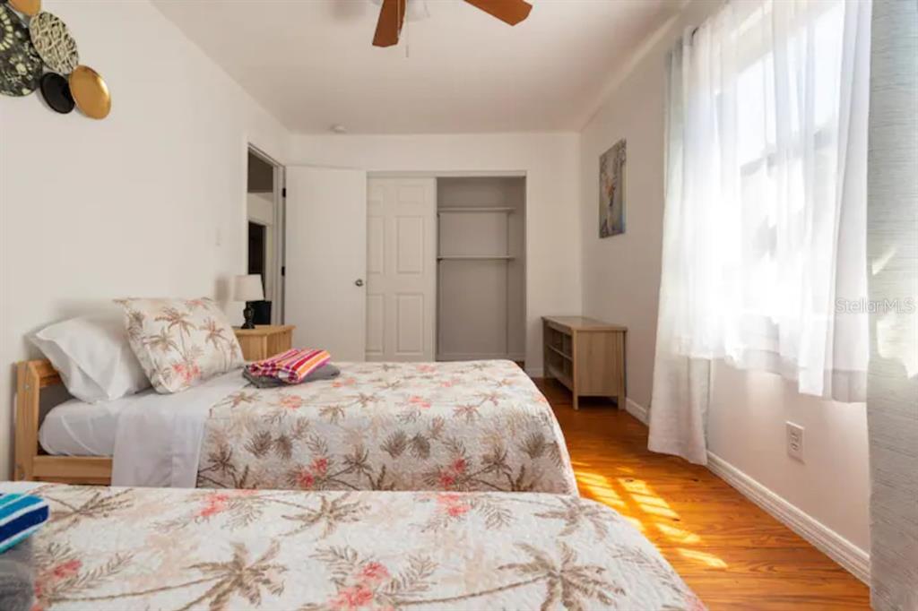 368 Ridge Road Southwest Largo, FL 33770 - Photo 24 of 46 a bedroom with a bed and a window