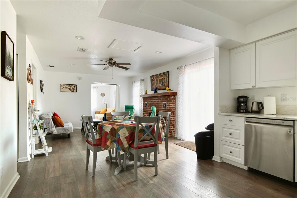368 Ridge Road Southwest Largo, FL 33770 - Photo 31 of 46 a view of a dining room with furniture window and wooden floor