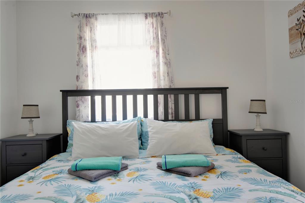 368 Ridge Road Southwest Largo, FL 33770 - Photo 36 of 46 a bedroom with a bed and a window