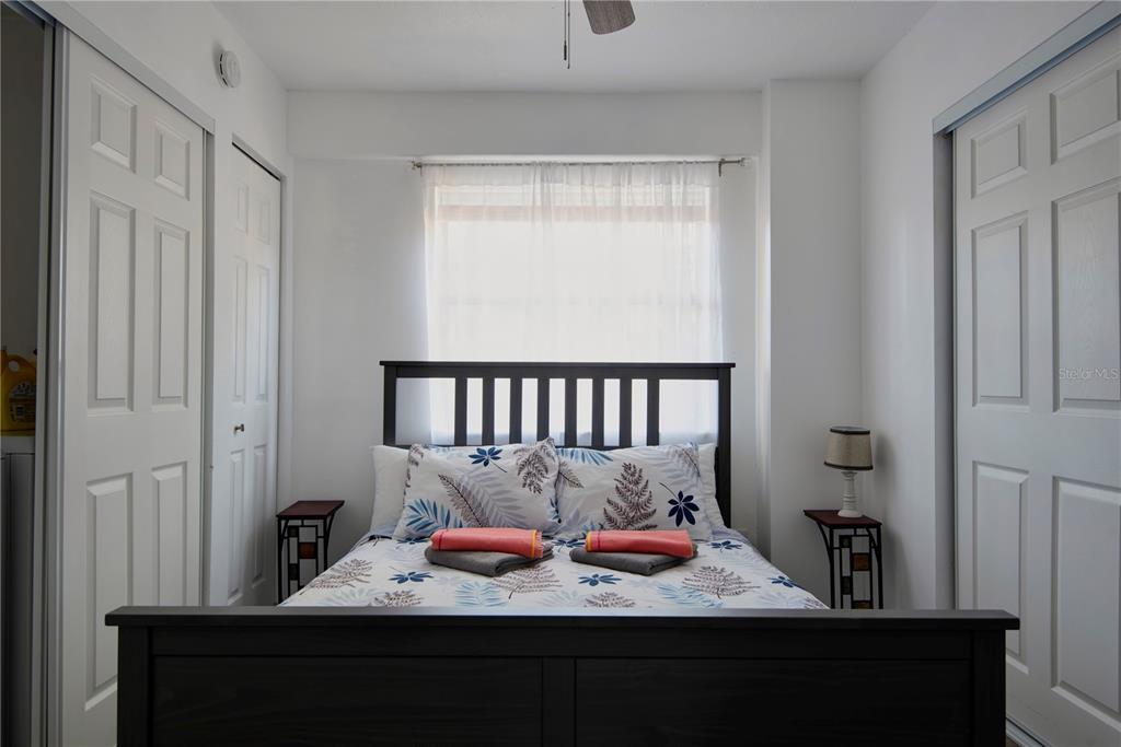 368 Ridge Road Southwest Largo, FL 33770 - Photo 42 of 46 a bed room with furniture and a window