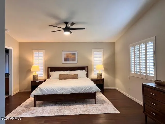 a bedroom with furniture and a window