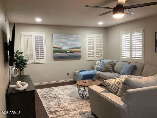 a view of a dining room with furniture and window