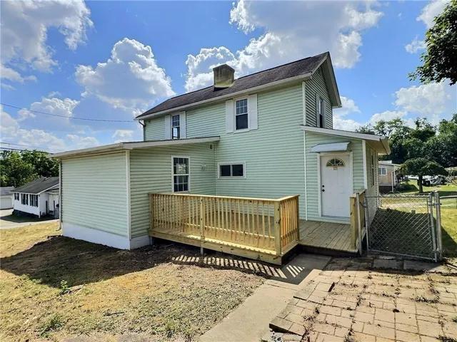 a view of backyard of house