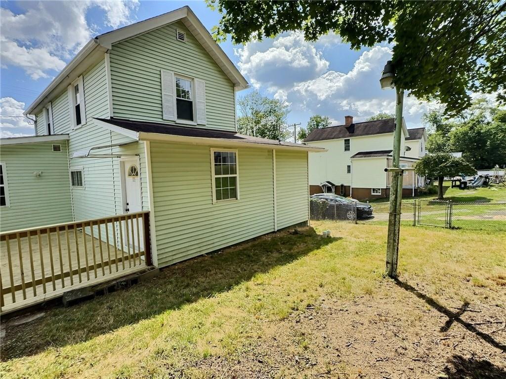 91 Blanche Road Fredericktown, PA 15333 - Photo 29 of 41 a view of a backyard with a large tree