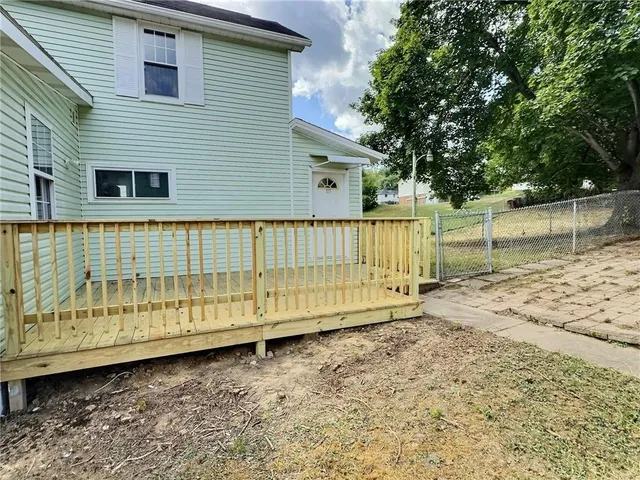 a view of a backyard of a house