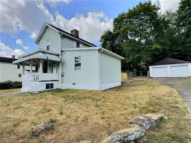 a front view of house with yard