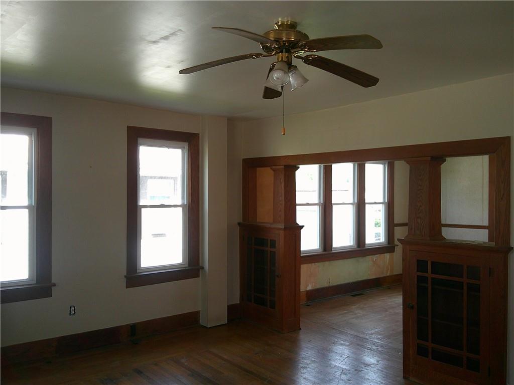 152 East Garrett Street Somerset, PA 15501 - Photo 6 of 18 a view of an empty room with a window and wooden floor