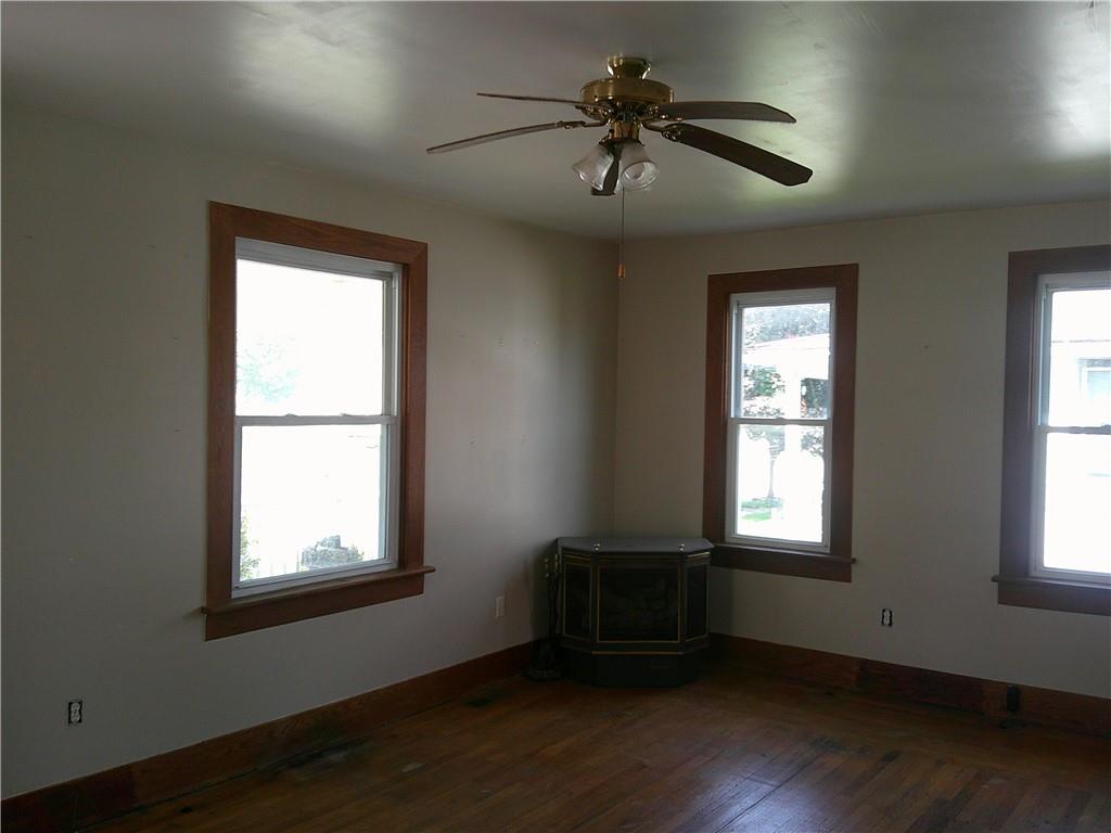 152 East Garrett Street Somerset, PA 15501 - Photo 7 of 18 a living room with hardwood floor and a window