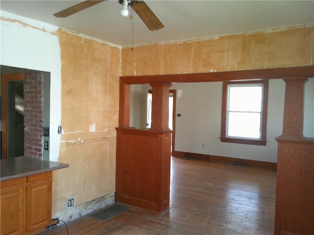 152 East Garrett Street Somerset, PA 15501 - Photo 9 of 18 an empty room with wooden floor and windows
