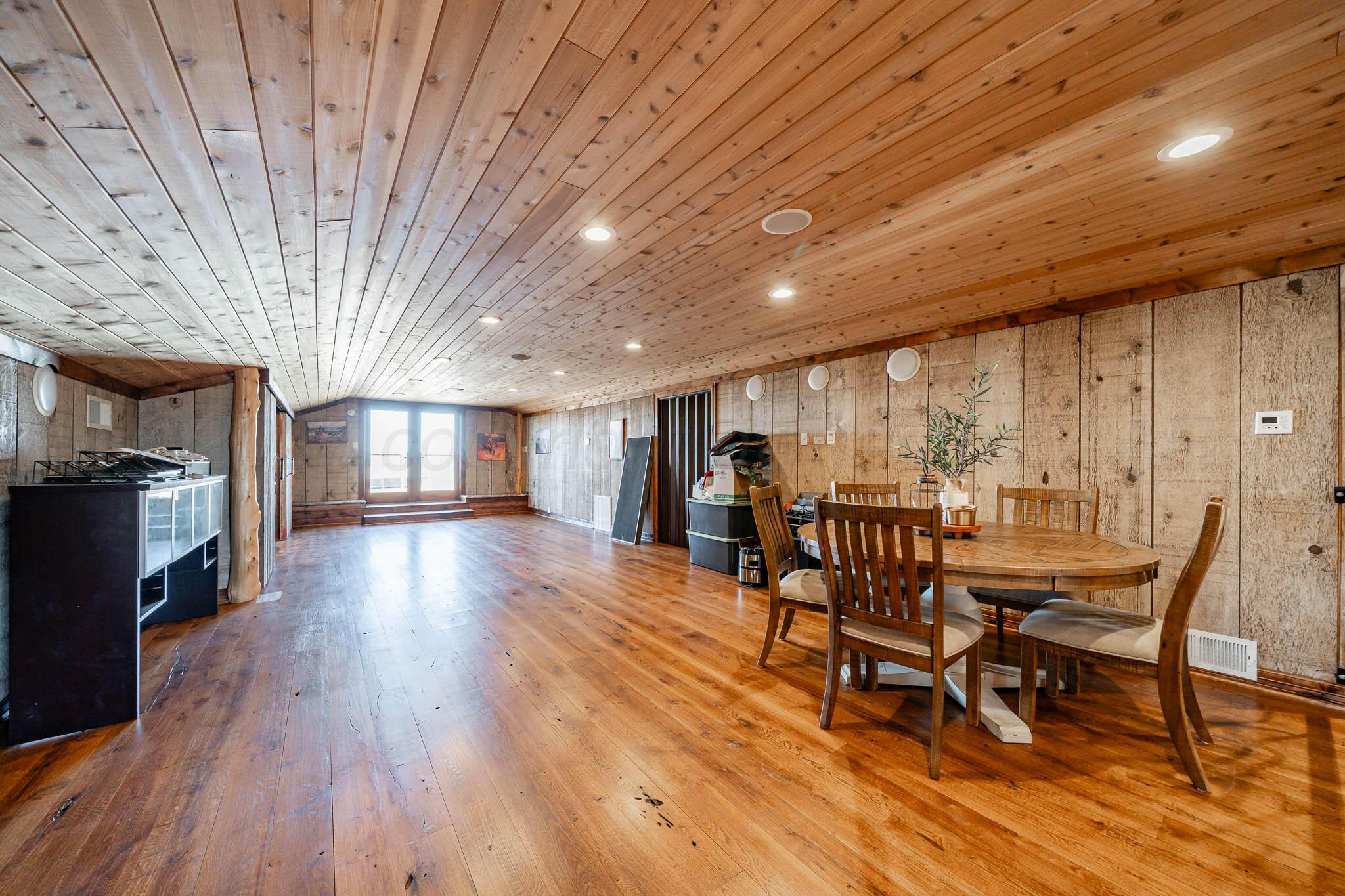 1000 Osage Street Wheeler, TX 79096 - Photo 28 of 57 a view of a dining room with furniture and wooden floor
