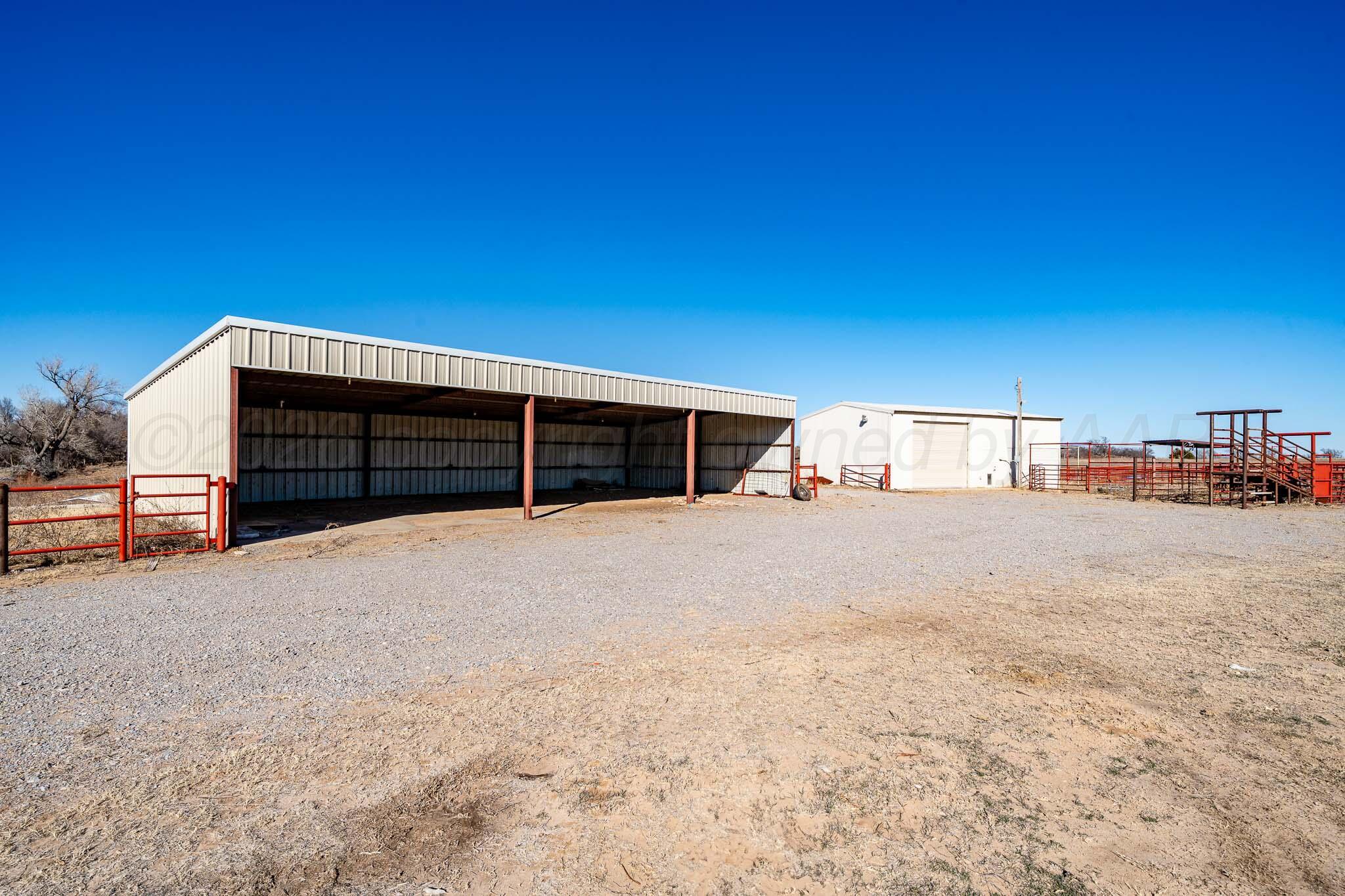 1000 Osage Street Wheeler, TX 79096 - Photo 42 of 57 a view of a house with a garage