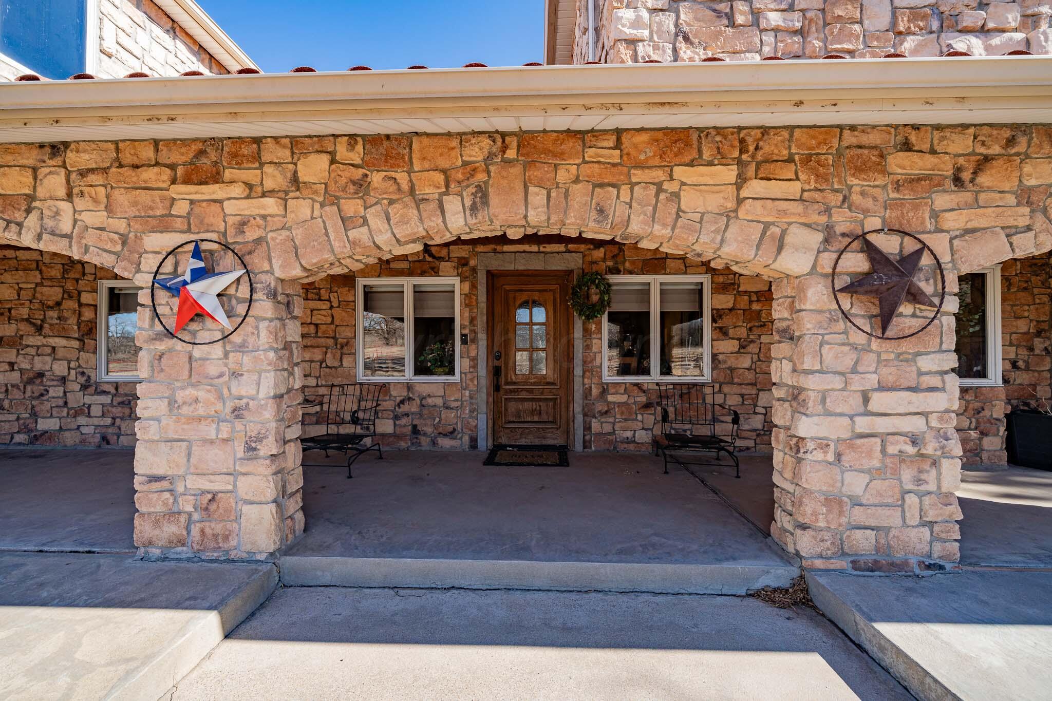 1000 Osage Street Wheeler, TX 79096 - Photo 5 of 57 a view of front door and outdoor seating