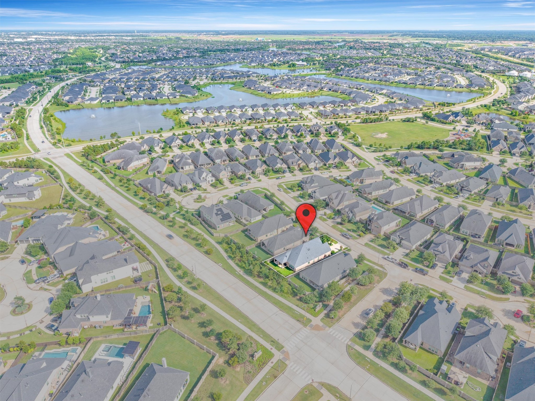 29118 Lantana Ridge Court Fulshear, TX 77441 - Photo 22 of 29 Take in this stunning aerial view of the community, showcasing its beautiful homes, inviting streets, and abundant amenities — giving a true sense of the vibrant, welcoming neighborhood.