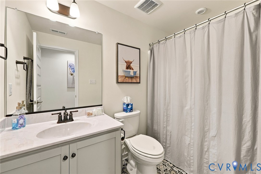 12824 Deep Wl Road Midlothian, VA 23112 - Photo 33 of 42 Basement Full Bath, black-finish faucet, and a la