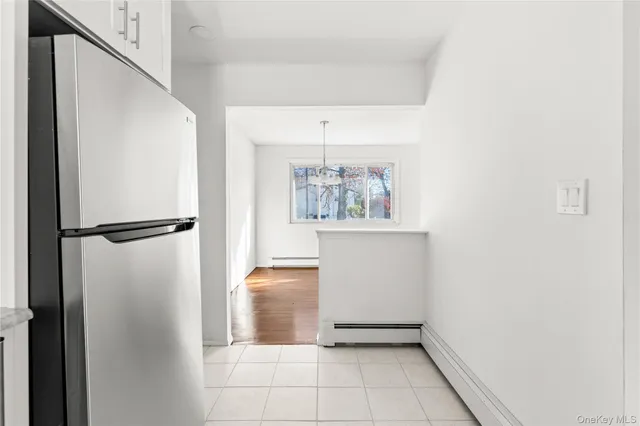 a view of a hallway with closet
