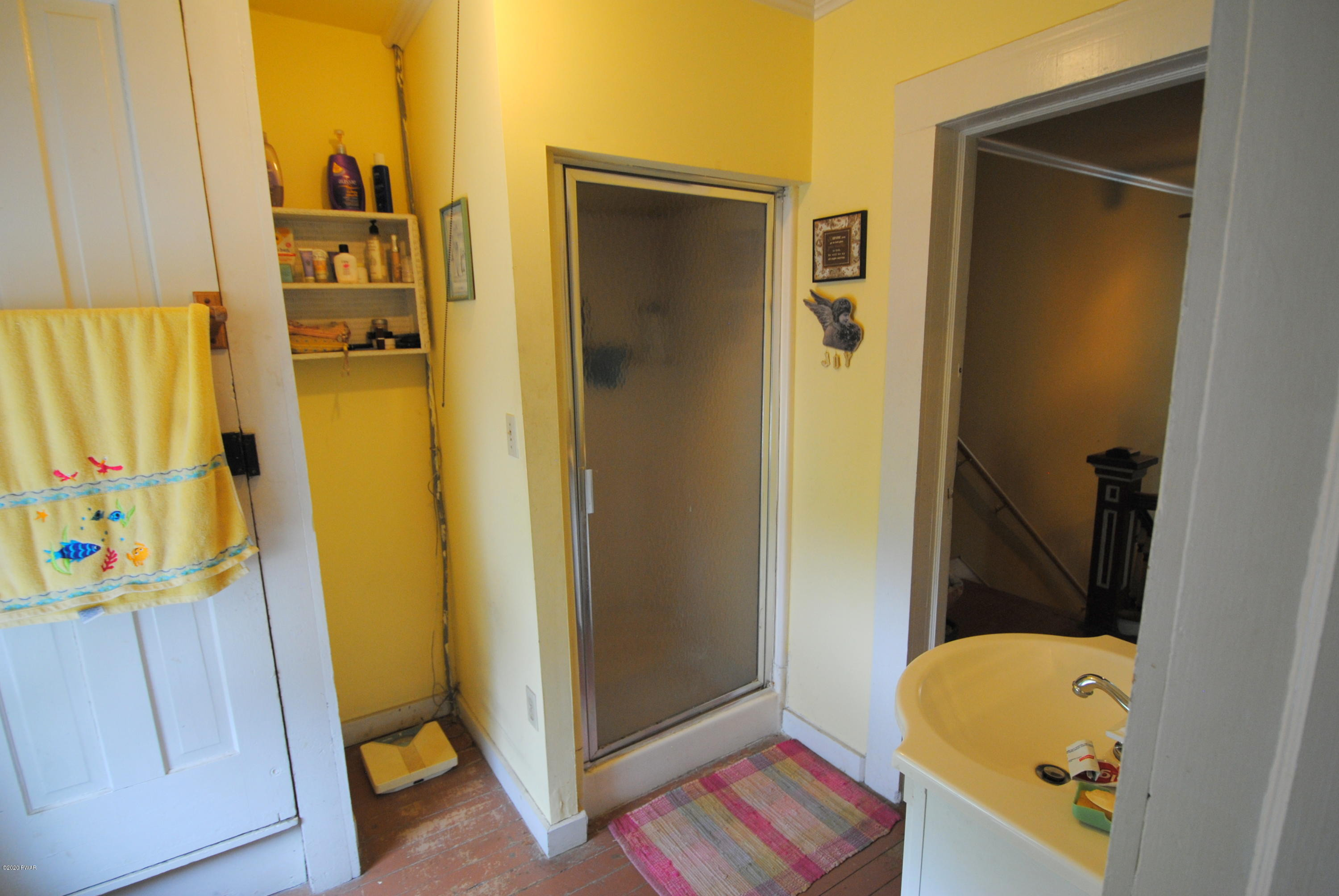 313 Old Racht Road Waymart, PA 18472 - Photo 36 of 39 a bathroom with a tub and a sink
